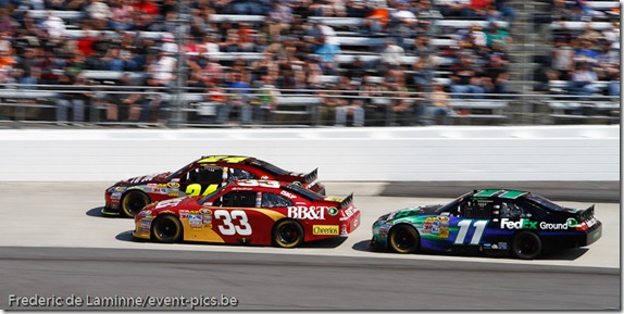 Jeff Gordon (24) lead Clint Bowyer (33) and Denny Hamlin (11) during the Goody's Fast Relief 500 at Martinsville